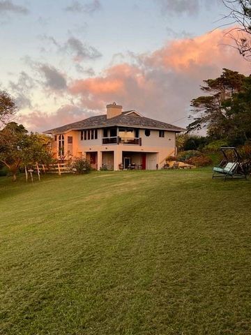 House of Morning Rainbows where sunsets and rainbows show up across the green fields with ocean views. Light and bright upstairs level encompasses 3 bedrooms/2baths. Living/dining/kitchen with lovely open living, large windows to bring in the beautif...