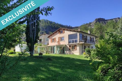 I offer you this very large house in the Digne les Bains area. the house is located in the small town of Marcoux in a quiet area. with a surface area of 223 square meters it offers the possibility of being divided into two separate apartments and als...