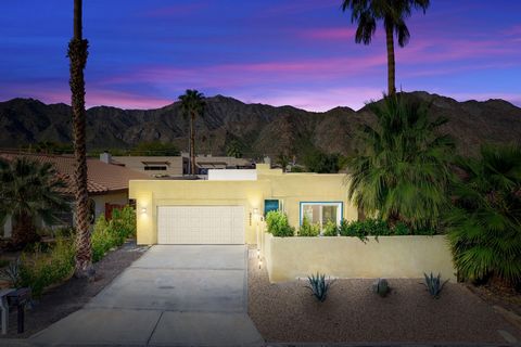 Escape to your contemporary oasis high in La Quinta Cove, where luxury meets natural beauty. Enter the tranquil front walled courtyard with low-maintenance artificial turf, providing privacy and breathtaking mountain views. Immerse yourself in the re...