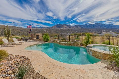 Breathtaking Views ~ Mountain & Golf Course. Beautiful & private Contemporary home on 1+ acres in Gated Sundance Ridge. Featuring 3 BD, 4 BA, Gathering room w/center sliding glass doors leading out to covered patio. Chef Lux Gourmet kitchen layout ~ ...