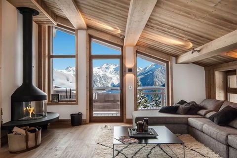 Located in a quiet area of the resort, close to all amenities, this charming chalet with a modern style offers spacious and pleasant volumes. It also benefits from a superb view of the surrounding mountains. Arranged with high quality materials and d...