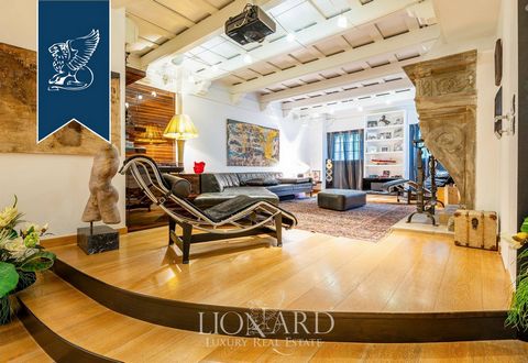 An exclusive apartment is sold in Milan with an area of ​​450 sq.In the luxurious area of ​​San Siro, opposite Scuderie de Monteil. Features include a private garden of 150 sq.m, a common pool, marble and Buzeri interiors. On two floors: a living roo...