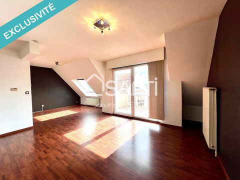 Superb 80 m² apartment, including 69 m² of living space, offering the possibility of converting its 2 rooms into 3, ideally nestled in La Wantzenau in a peaceful residence in the heart of the village. Close to the banks of the Ill, with a bus stop ju...