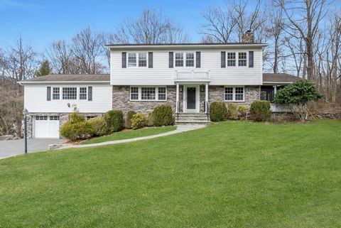 Welcome to 30 Whitlaw Lane, Chappaqua A sophisticated 4-bedroom, 2.5-bathroom center hall colonial exuding elegance and timeless charm. This residence boasts superior craftsmanship and thoughtful upgrades, ensuring a home of unparalleled warmth and c...