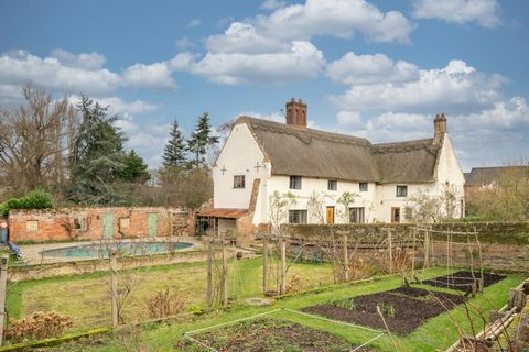 A beautiful Grade II listed thatched farmhouse, this is a home that’s bursting with authentic character. Lovingly restored in recent years using traditional materials and craftsmanship, it offers contemporary comforts with great integrity and combine...