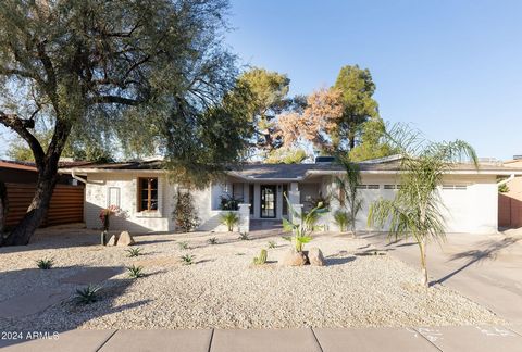 A true gem, remodeled home in the heart of Old Town Scottsdale, combining luxury, comfort, and southwestern charm. This one-of-a-kind property features authentic Saltillo tile flooring, creating a warm, earthy ambiance. Windows and doors are custom-c...