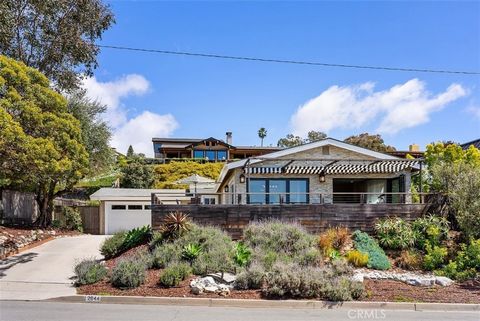 Ocean, Catalina Island, and sunset views from this beautifully remodeled SINGLE-LEVEL, Top of the World home. This is a spacious, 3-bedroom home, completely remodeled in soft-contemporary and streaming with natural light. Located in the highly desira...