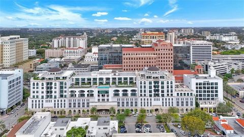 Discover luxurious living in the heart of Coral Gables with these two unique condos seamlessly combined into one phenomenal space (4, 986 SF). This property is a true sanctuary, boasting 11-ft. ceilings, four balconies, a private elevator foyer, two ...