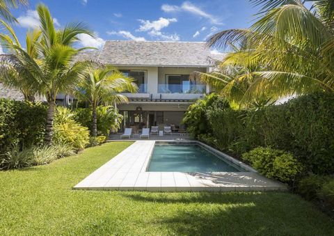 FOR SALE VILLA IRS ON THE EAST COAST OF MAURITIUS Semi-detached residence of one floor with an area of 233 m2, combining elegance and luxury thanks to its master bedroom with balcony, which dominates the entire first floor on 30 m². Its modern kitche...