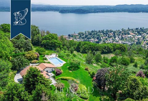 This prestigious villa for sale is in an exclusive panoramic position by Lake Maggiore, in one of the most affluent and elegant districts of the renowned town of Lesa, and offers breathtaking views. Recently renovated and perfectly preserved thanks t...