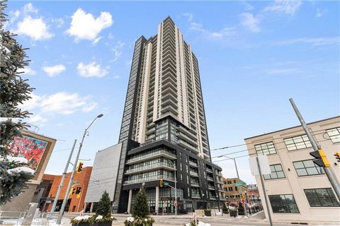 Experience urban living at its finest in this stylish one-bedroom plus den condo, perfectly situated just a two minute walk to the LRT station. Nestled within a modern and secure building, this condo offers a blend of contemporary design and convenie...