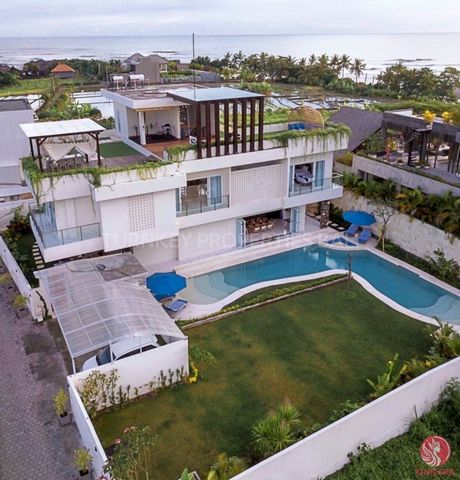 This brand new luxurious private villa is set in expansive grounds of 990 sqm and is surrounded by calming rice field views tended to by local farmers and the sounds of the ocean (only) a close 100 meters away. The villa features 5 spacious bedrooms ...