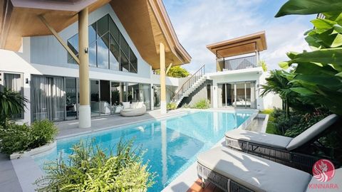 Experience the epitome of luxury living in this stunning 4-bedroom, 5-bathroom pool villa nestled in the prestigious Laguna area of Phuket, just 15 minutes from the breathtaking Layan Beach. This elegantly designed residence harmoniously combines sty...