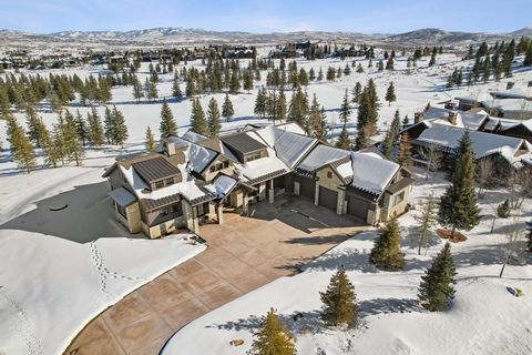 Nestled on the prestigious 14th fairway of Glenwild, rated Utah's #1 golf course for many years, this exquisite home redefines mountain luxury and modern sophistication. Designed with meticulous attention to detail and an emphasis on organic material...