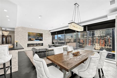 Ratcliffe Icon. A stunning glass-wrapped one-level, condo floats above the pulse of Uptown's cultural/central business district, offering one of the most dramatic vantage points in the city. A rare combination of clean-lined spaces that are both soph...