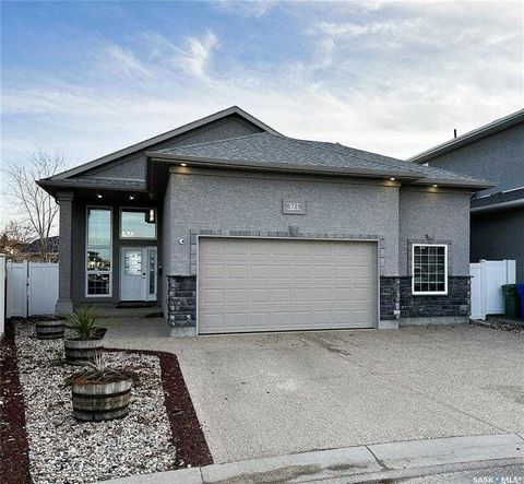 Amazing opportunity to get into the very private neighborhood of Maple Ridge in Northwest Regina. This house is close to schools and very close to a wonderful splash park. This bi-level, a former show home, has been immaculately maintained and has ha...