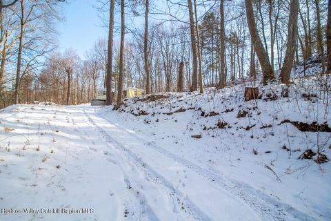 Magical Woodland Escape. This enchanting property feels like a private retreat, surrounded by stunning rock outcroppings, a sparkling stream, and pristine forest, yet it's conveniently close to everything. The well-situated cabin offers endless poten...