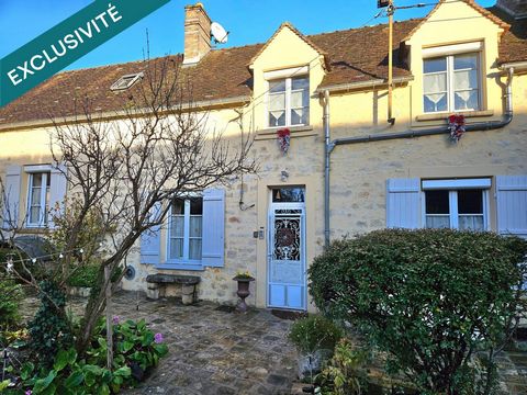Maison de caractère avec jardin et à proximité des commerces.