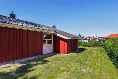 This beautiful cottage built in 2008 is located in OstseeStrandpark Grömitz, which is a cozy holiday area located approx. 250 m from a lovely sandy beach with a short distance on foot or by bike to the city center. The panoramic windows, the modern f...