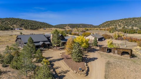This remarkable ranch is situated in the beautiful Cherry Creek Valley in SW Colorado, only 30 minutes from Durango. The ranch features a stunning ranch home, 2 additional homes, large shop building and spacious hay barn. The ranch is 1,222+- ac with...