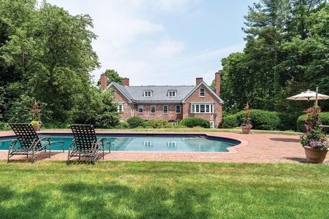 In the Green Hill estate area c.1930 brick English Revival style residence offers large scale entertaining with comfortable living space of 6,738 sf. of traditional style and grace. A delightful reception/sitting area accented by three sets of french...