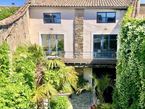 Behind the facade of this impressive townhouse lies a beautiful family home full of original character features combined with the comforts of modern living. The walled, terraced garden has a mezzanine sun-lounging area complete with 3m x 6m plunge po...