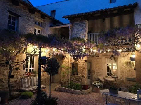 Description: Welcome to this splendid restored stone townhouse, located in the heart of a charming village near Orange. A former stone convent, this property offers a unique fusion of historic character and contemporary comfort. With its generous 200...