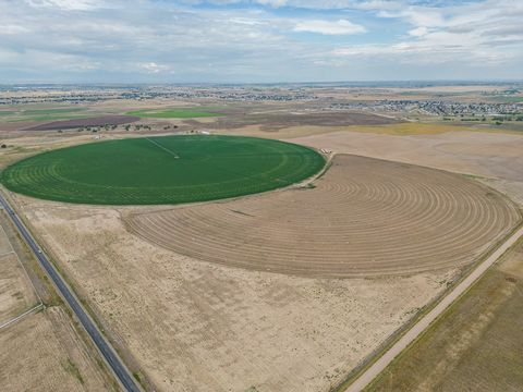 Primely located land with unlimited opportunities! This 243 acre site features 190 pivot irrigated acres of good alfalfa. It is watered by +-314 tradable acre feet of Class D Allotment of Central Colorado Water Conservancy District. In addition, it a...
