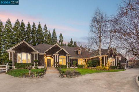 Nestled at Erselia Trail's end, this single-level estate on nearly an acre impresses with a 4,214 sqft main house and a charming 914 sqft ADU. Craftsmanship shines with crown molding, wainscoting, and custom casings. High ceilings, hardwood floors, a...