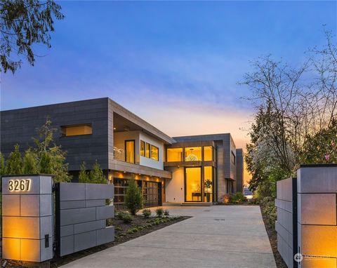 Experience quintessential luxury living in the heart of Medina with breathtaking panoramic views of Lake Washington, Seattle & the Olympic Mountain Range. This gated residence is a testament to upscale living, equipped with a State-of-the-Art Theater...