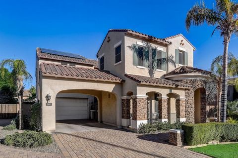 Welcome to your dream home in a prime Gilbert location. This stunning property features 6 bedrooms, 4.5 bathrooms, providing ample space for both family living and entertaining guests. It also includes 2 stairways, a loft, a movie theatre and a 2nd m...