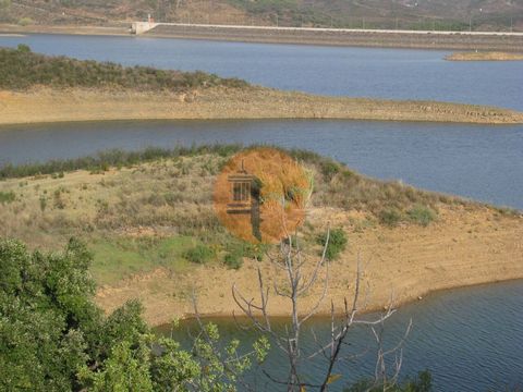 Rustic land with 27,600m², in Alcarias Grandes - Azinhal - Castro Marim - Algarve. The land borders the Beliche Dam. By the water. The land has a few trees: fig trees, almond trees, carob trees, olive trees and cork oaks. The property has topography....