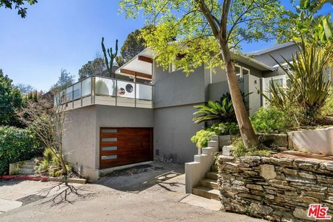 Welcome home to this Mid-Century Modern residence nestled in the hills of Nichols Canyon. Along with the spacious floor plan, this home features three bedrooms and three baths, enveloped in an abundance of natural light that illuminates every corner....