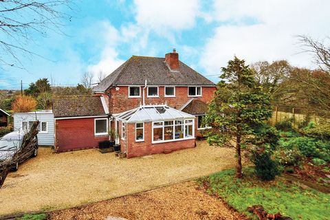 Situated in an Area of Outstanding Natural Beauty in the delightful hamlet of Chale, occupying a generous one-acre plot is this wonderful, much extended and versatile five-bedroom property.   The ground floor is rather special, divided into two separ...
