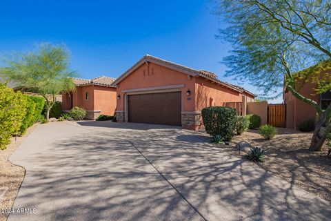 Your chance to buy in gated Windgate Ranch. Like new MOVE IN READY modern 1 story with fabulous back yard/pool/spa/fire pit/BBQ and MTN VIEWS! Open and bright. Wood floors, chef's kitchen with gas cook top, double oven, and qtz c'top, Wolf appliances...