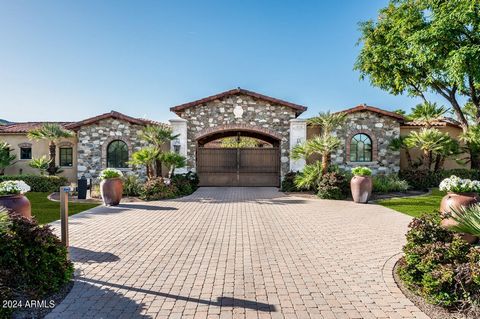 You must drive by this! It is an absolutely beautiful and completely walled, electronically gated estate! Enter thru a dramatic stone archway into an elegant courtyard with a large circular paver drive to the main residence which is not visible from ...