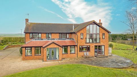 The Property Positioned in a stunning rural location, the uninterrupted far-reaching views from all sides of the house are incredibly hard to beat. Approached via a five bar gate leading to ample parking for a number of vehicles. Upon entering this f...
