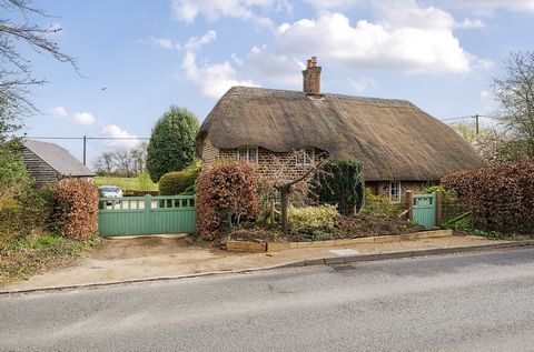 Originally an old worker's cottage set on the Bowood Estate, this charming two-bedroom thatched Grade II listed home is nestled within well-developed gardens and comes with a double garage and an annexe. Positioned alongside similar standout properti...