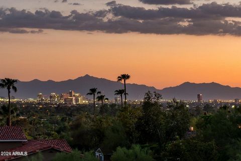 Experience the timeless and stately views of Camelback Mountain, City Lights and Downtown Skylines at this 1.29 acre site in prestigious Paradise Valley, Arizona. Perfectly perched on a quiet and picturesque private street with multi-million-dollar h...