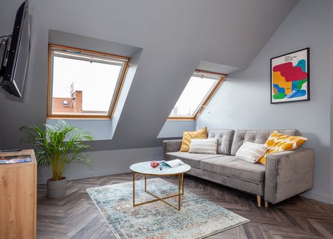 Experience the ultimate comfort and tranquility during your stay in Wroclaw with our elegant Airbnb located in the historic Tenement House under the Three Lilies. The apartment is tastefully decorated with modern furnishings and comes equipped with a...