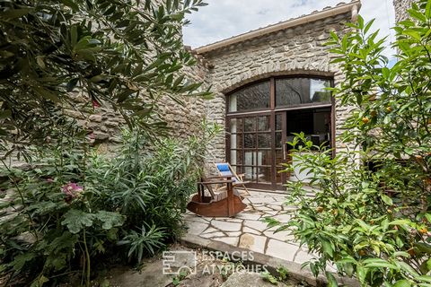 In the picturesque village of Pépieux, a singular house stands, partially enclosed under the ramparts, evoking a bewitching medieval charm. Through its stone walls, carefully restored with exquisite materials, one notices the meticulousness of the la...