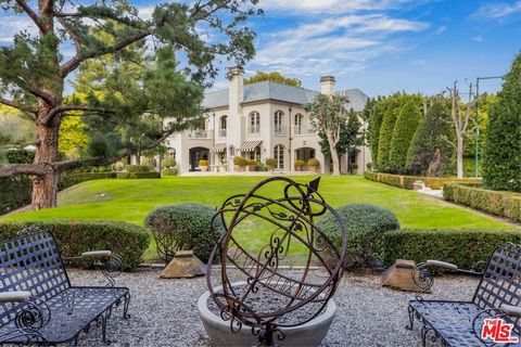 Exquisite Bel Air Tennis Court Estate nestled on nearly 1.5 park-like acres. A true sanctuary offering privacy and seclusion, featuring 7 bedrooms and 10 bathrooms. Grand entertaining spaces including a large step-down living room with a wood burning...