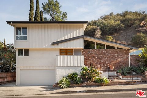 Serene Mid-Century with stunning architectural lines and tasteful industrial style finishes throughout, located in the heart of the Encinos hills. This home is situated on a private cul-de-sac and features 3 bedrooms, 3 bathrooms, endless entertainin...