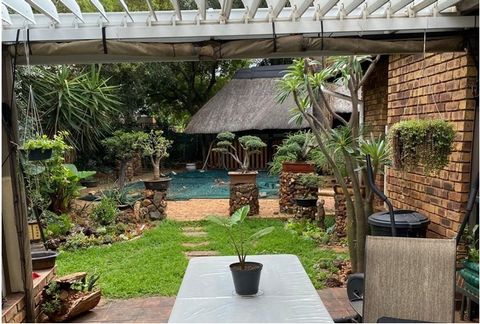 Situated in the sought-after area of Eldoraigne lies this quaint property with its lush green garden. As you enter this home an inviting living room greets you flowing into a big and comfortable study for those wanting to work from home. There are th...