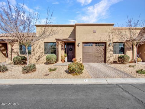 Imagine waking up every day to the perfect Arizona retreat, where relaxation & comfort define your lifestyle. This 2BR | 2BA home offers 1,185 sq. ft. of thoughtfully designed living space ideal for enjoying the good life. Tall ceilings, an open floo...