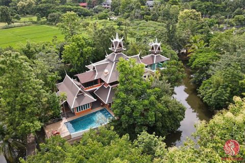 Absolutely unique 3-bedroom pool villa built on a small island surrounded by lush garden in Mae Rim. This property, renovated from a classic building and finished with luxury touches, blends classic Lanna architecture with the beautiful natural surro...