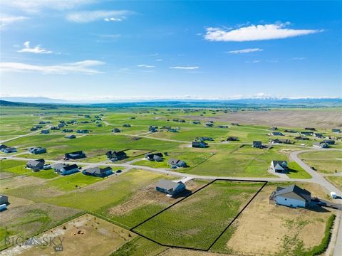 Imagine sitting on your front porch sipping a cup of coffee, watching the sunrise as the world comes to life and the mountain views come into focus. Today is the day to build your Montana dream home on the rolling hills of this beautiful lot at the V...
