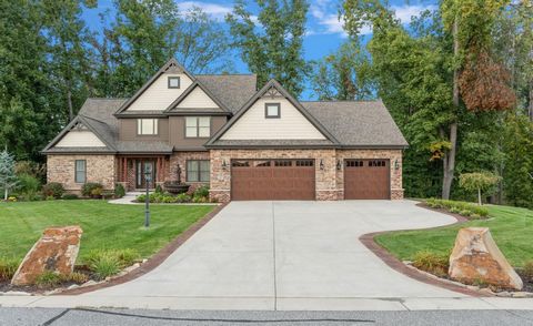Step into the lap of luxury with this magnificent 5,118 square foot home nestled in the coveted Sagamore subdivision in Valparaiso. With its stunning design and spacious layout, this home offers the perfect blend of elegance and comfort. Featuring 4 ...