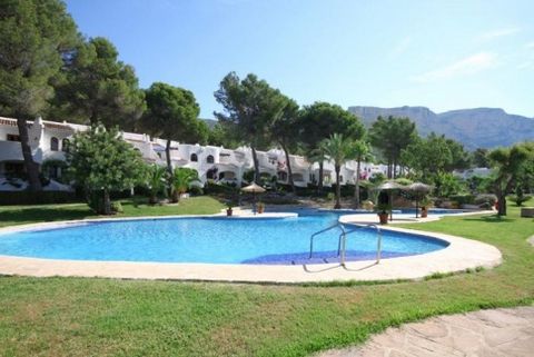 Lovely south facing duplex apartment for sale in the beautiful, popular development of Los Lagos, close to the village of Jesus Pobre and midway between the beaches of Javea and Denia. The apartment is entered through a gated covered terrace which le...