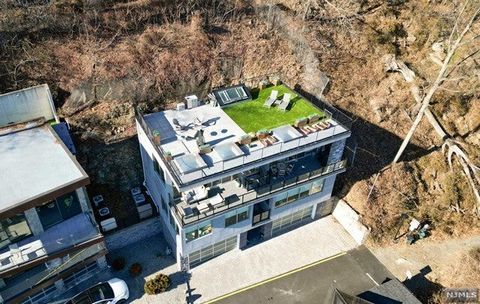 Captivating contemporary residence with breathtaking NYC views! Nestled on a corner property against the Palisades with access to 2500 acre park offering Hiking, Biking and kids Playground. Every detail of this newly constructed, home is meticulously...